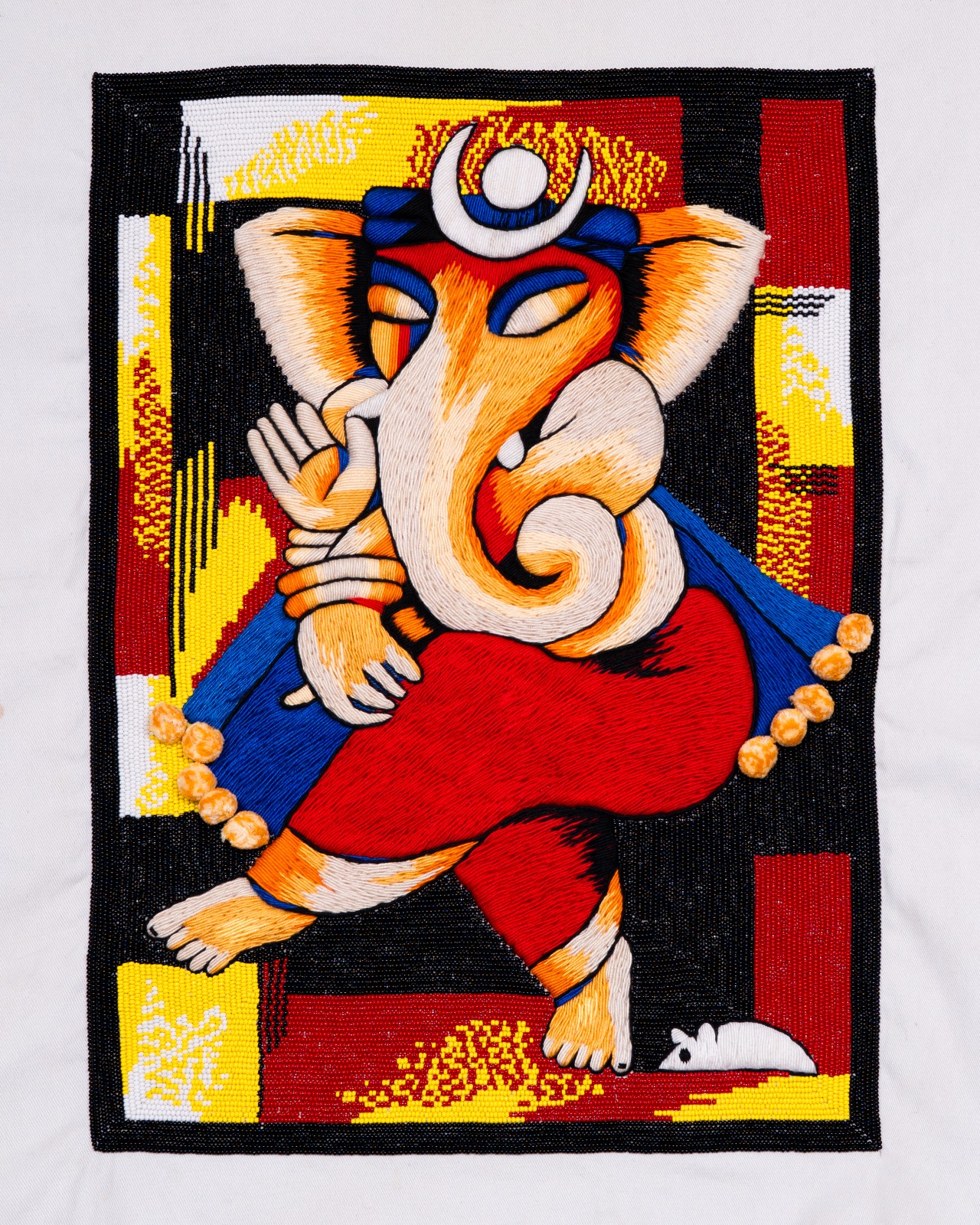 Dancing Ganesha in vivid hand-beaded colour